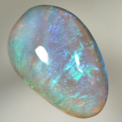 SOLID CRYSTAL OPAL Bright green fire in a 3 dimensional pattern